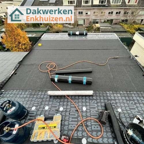Plat dak opnieuw leggen Plat dak Enkhuizen opnieuw leggen