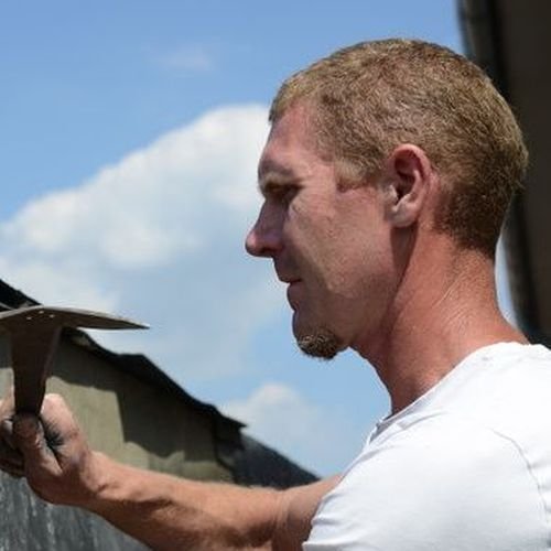 Zijkant-bekleden-met-shingles Dakdekker Enkhuizen met nokvorsten